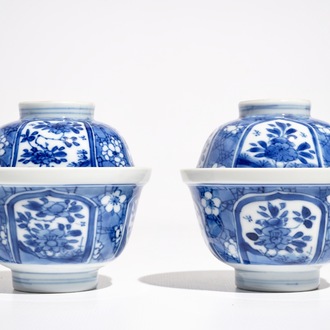 A pair of Chinese blue and white "prunus on ice" covered bowls, Kangxi