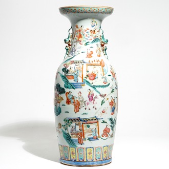 A tall Chinese famille rose vase with a fine circular design, 19th C.