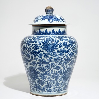 A large Chinese blue and white lotus scroll baluster vase and cover, Kangxi