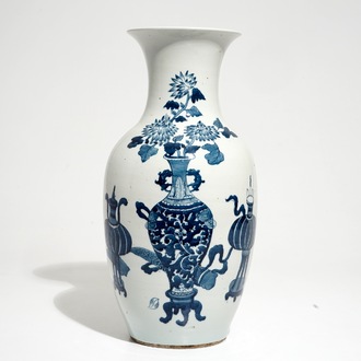 A Chinese blue and white vase with incense burners and furniture, 19/20th C.