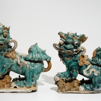 Two Chinese turquoise-glazed roof tiles shaped as temple lions, 17/18th C.