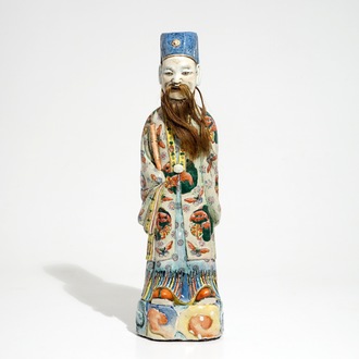A tall Chinese famille rose figure of an immortal, 19th C.