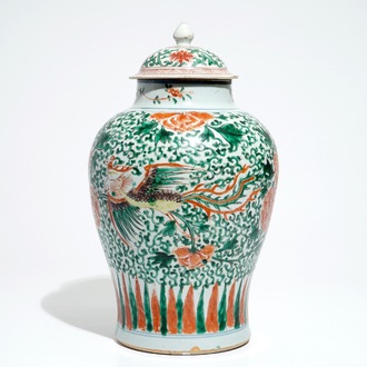 A Chinese wucai baluster vase and cover with phoenixes, Transitional period
