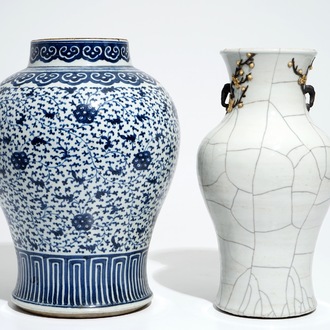 A Chinese crackle-glazed vase and a blue and white lotus scroll baluster jar, 19th C.