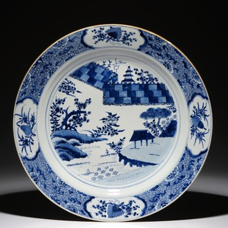 A very large Chinese blue and white charger with the Chinese wall, Kangxi