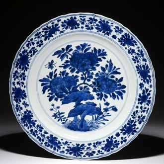 A Chinese blue and white dish with floral design, Kangxi mark and of the period