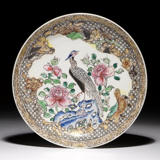 A Chinese famille rose plate with a peacock, Yongzheng