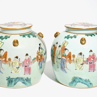 A pair of fine Chinese famille rose jars and covers with a fine design around, 19th C.