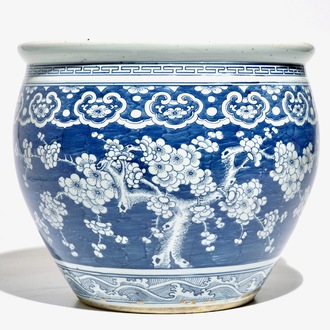 A Chinese blue and white fish bowl with design of prunus on cracked ice, 19th C.