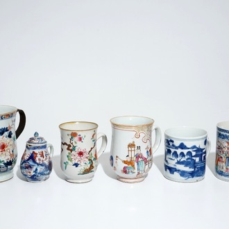 Five Chinese famille rose and blue and white mugs and a covered jug, mostly Qianlong