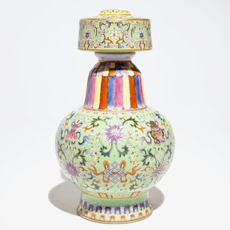 A Chinese famille rose on lime green-ground vase, Qianlong mark, 20th C.