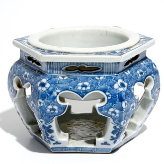 A Chinese blue and white hexagonal tea cup basin or kensui with prunus on cracked ice, Kangxi