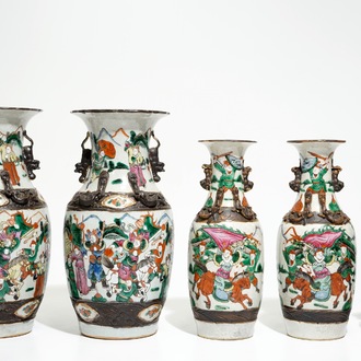 Two pairs of Chinese Nanking famille rose vases and a smaller one, 19/20th C.