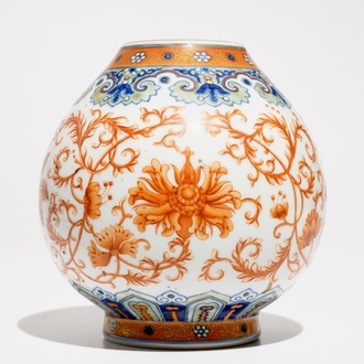 A Chinese doucai and iron-red flower scroll vase, Qianlong mark, 20th C.