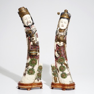 A pair of tall Chinese polychrome ivory figures, early 20th C.