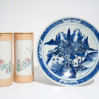 A pair of Chinese famille rose salmon pink-ground hat stands and a blue and white charger, 19/20th C.