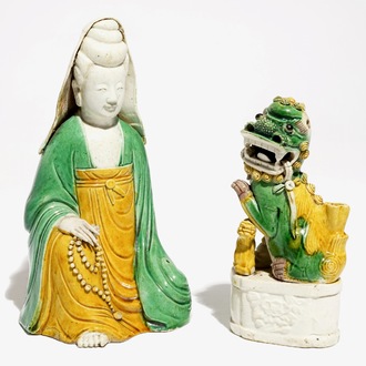 A Chinese verte biscuit Guanyin and a Buddist lion joss stick holder, Kangxi