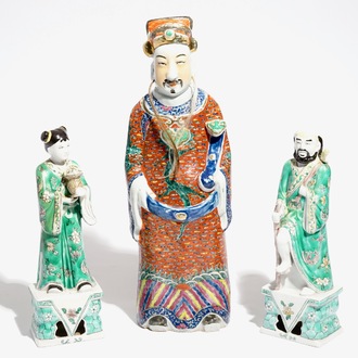 A Chinese famille rose figure of an immortal and a pair of famille verte figures, 19/20th C.