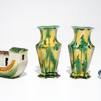 A pair of spinach and egg lozenge-shaped vases, a verte biscuit model of a boat and a miniature vase, Kangxi