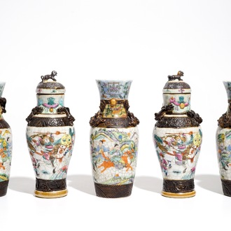 Two Chinese Nanking famille rose covered vases and three Nanking famille verte vases, 19th C.