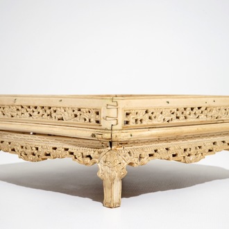 A large Chinese carved ivory stand, 18/19th C.