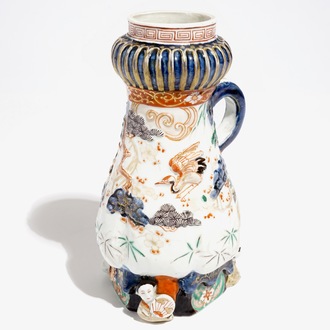 A Japanese Imari coffee jug with applied design, Edo, late 17th C.