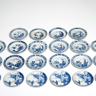 Twenty-two Chinese blue and white saucers, mostly Kangxi