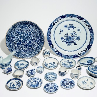 A collection of Chinese blue and white porcelain including chargers, cups and saucers and sauce boats, 18/19th C.