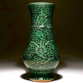 A rare Chinese verte-noire biscuit lotus scroll vase, Kangxi