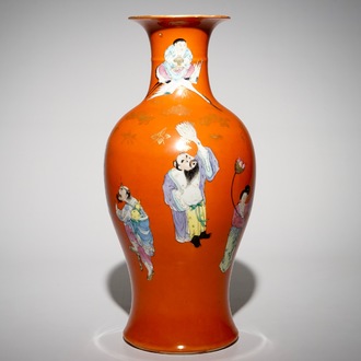 A Chinese coral-ground vase with immortals, Qianlong mark, Republic, 20th C.