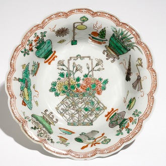 A Chinese famille verte lobed bowl with antiquities design, Kangxi