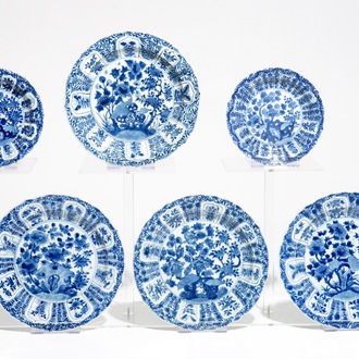 Four Chinese blue and white plates and two smaller plates, Kangxi