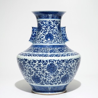 A Chinese blue and white lotus scroll hu vase, Qianlong mark, 19th C.