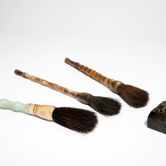 A Chinese stone stamp and three Chinese calligraphy brushes of bamboo, jade and horn, 19/20th C.