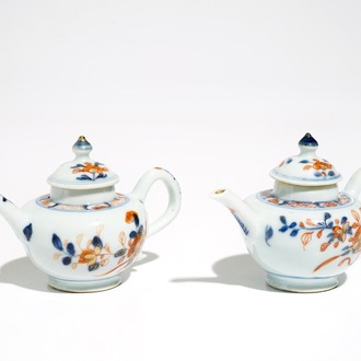 A pair of miniature Chinese Imari style teapots and covers, Kangxi