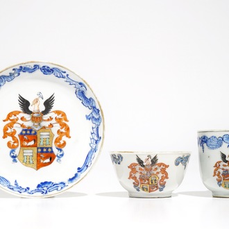 Two Chinese armorial cups and a saucer for the Belgian market, Qianlong