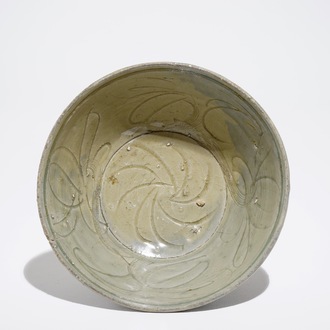 A Chinese incised celadon shipwreck bowl, Song