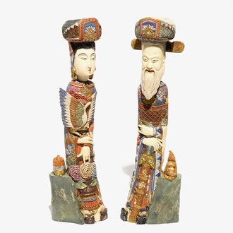 A pair of Chinese polychrome ivory figures, early 20th C.