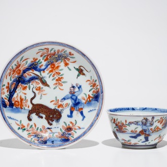 A Chinese Dutch-decorated Amsterdams bont cup and saucer with a tiger, Kangxi/Qianlong