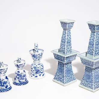 Five Chinese blue and white candlesticks, 19/20th C.