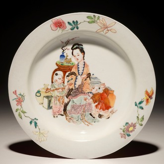 A Chinese famille rose ruby back eggshell plate with a lady and playing boys, Yongzheng