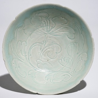 A Chinese incised qingbai foliate bowl with underglaze floral design, Song