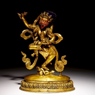 A Tibetan gilt bronze figure of Simhavaktra, 18th C.