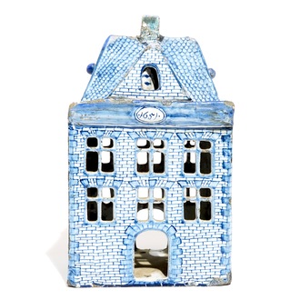 A Dutch Delft blue and white model of a house, 18th C.