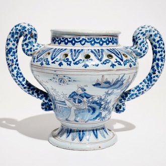 A Nevers faience chinoiserie flower holder in blue, white and manganese, France, 17th C.