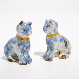 A pair of small polychrome Dutch Delft models of cats, 18th C.