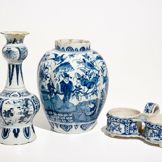Two Dutch Delft blue and white chinoiserie vases and a cruet stand, 17/18th C.
