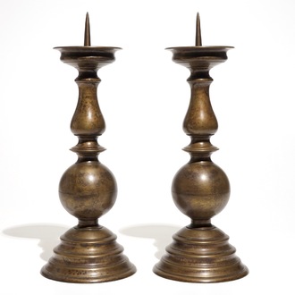 A pair of large Flemish bronze pricket candlesticks, 17th C.