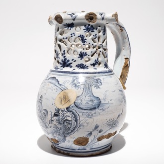 A French faience blue and white puzzle jug, poss. Lille, 18th C.