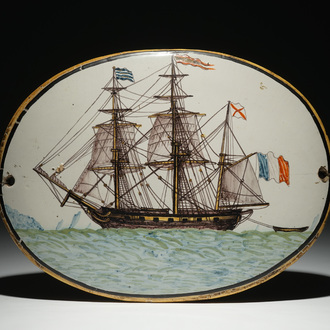 A polychrome French faience plaque with a three-master, 19th C.